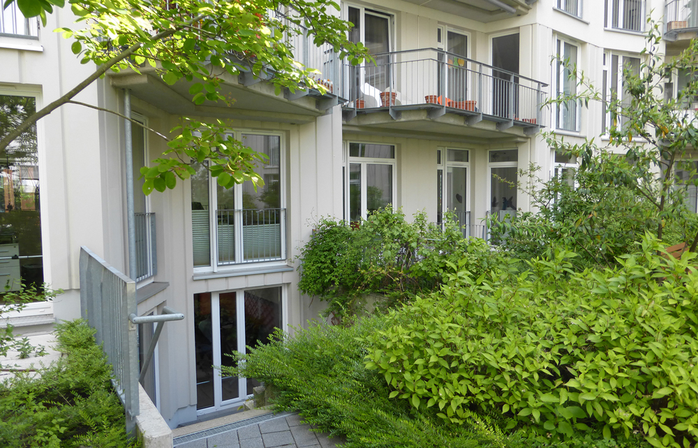 All ground floor flats have direct access to the shared garden and many are duplex, featuring step-down entrances from the podium level