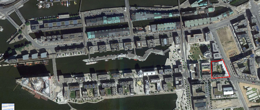 The block is outlined in red and is adjacent to a busy main road 