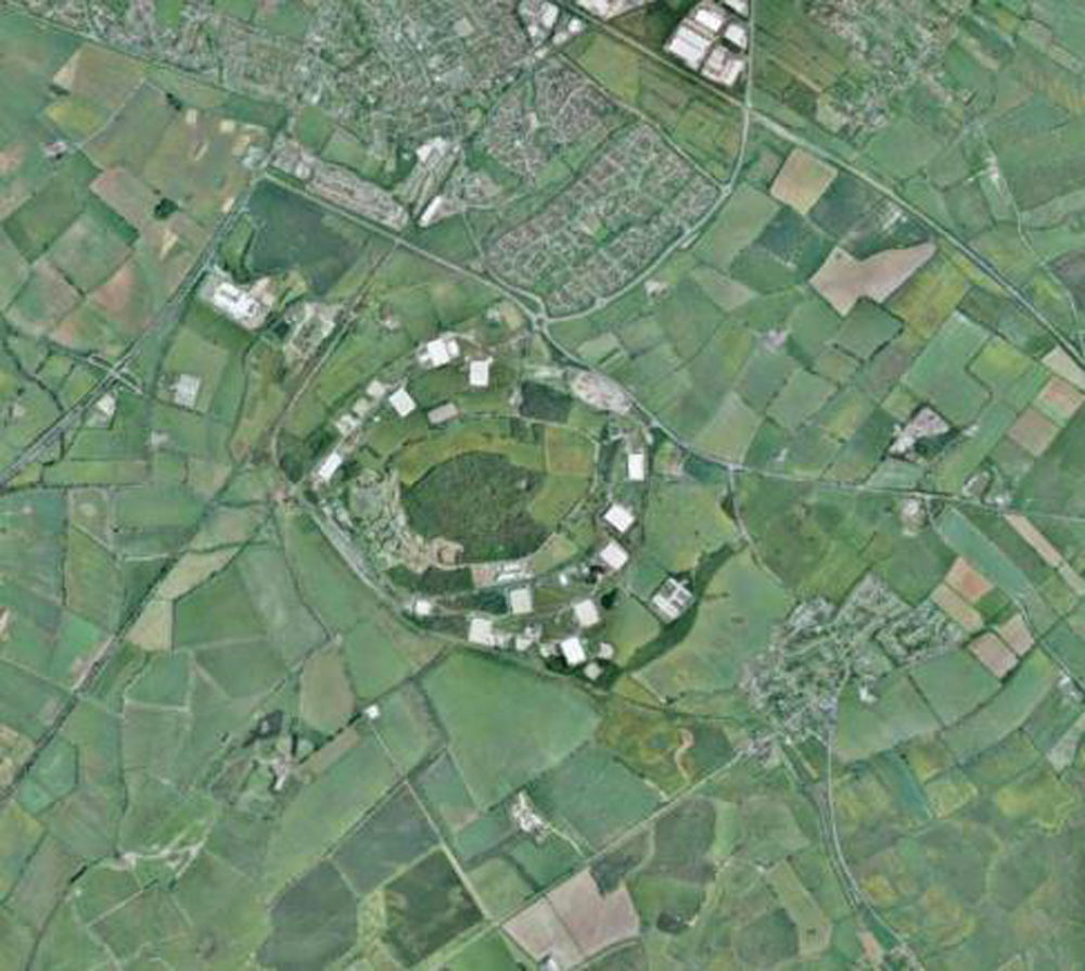 The area identified for private homebuilding will be mainly to the north of the wooded hill in the aerial photograph above 
